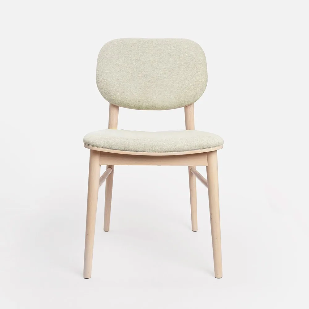 Upholstered dining chair product reference showing seat construction, legs, and back shape the Skill will preserve