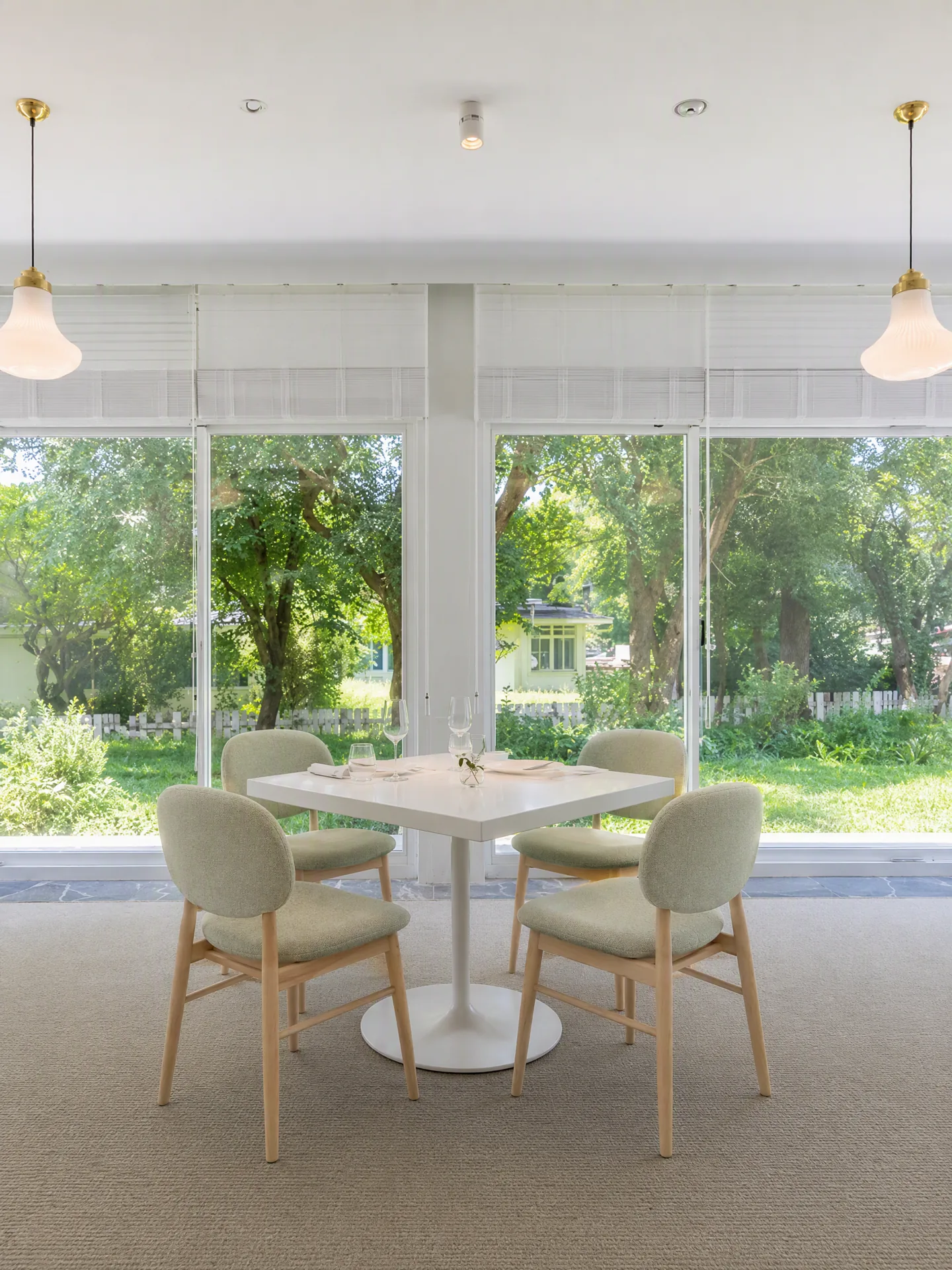Upholstered chairs arranged in the fixed dining room