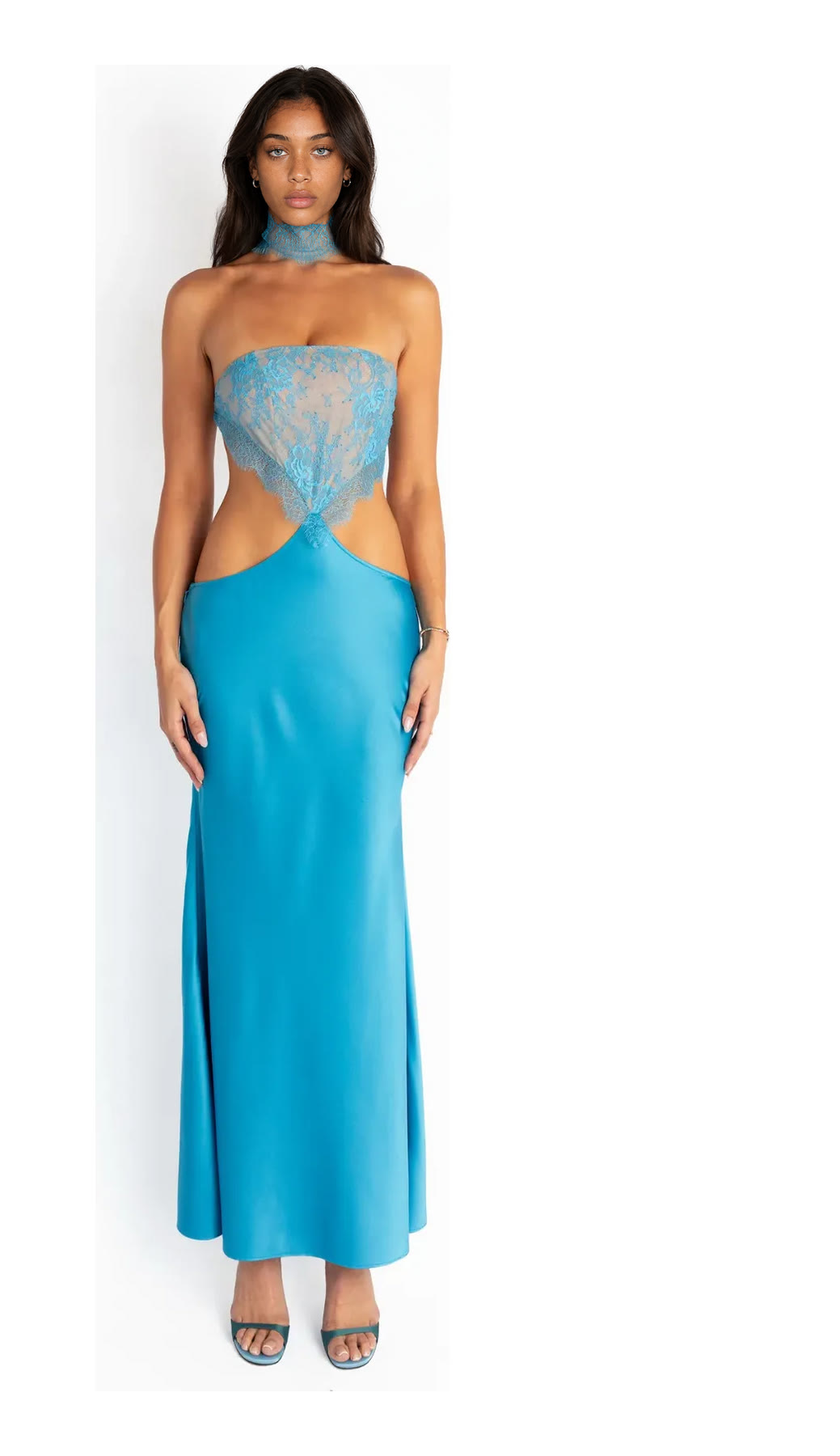 Kate modeling a blue lace and satin gown on a white background