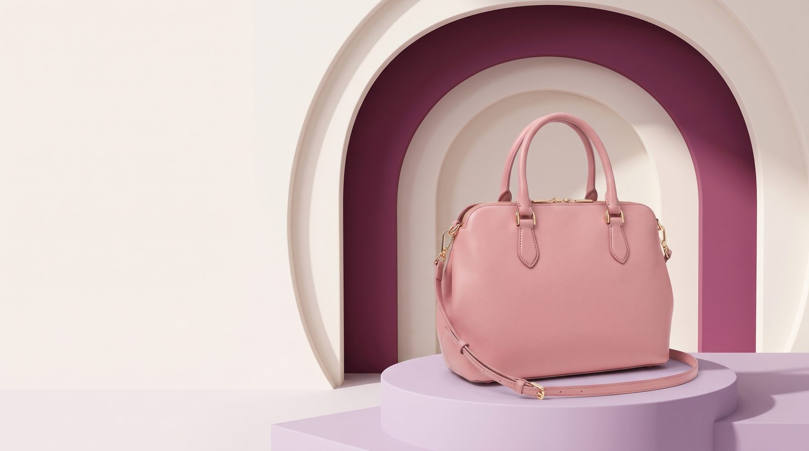Nano Banana 2.1: Input: pink handbag on white; output: geometric podium + circular arch